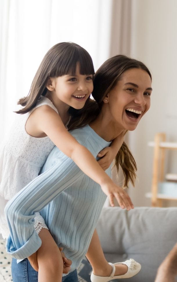 happy mother holding her child