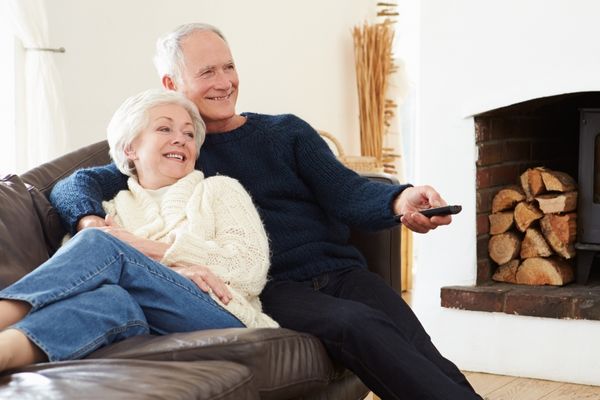happy older couple at home comfortable