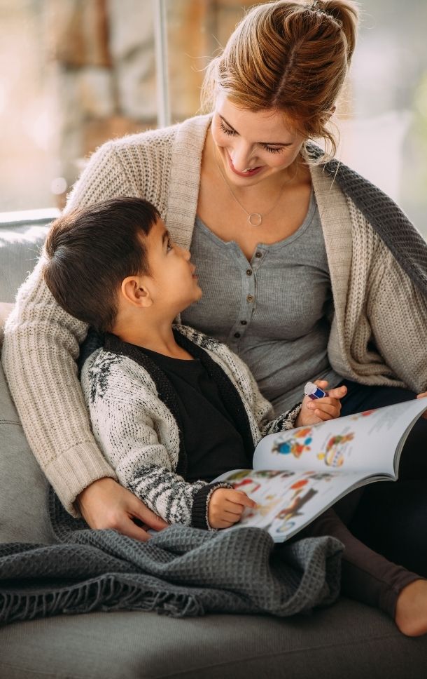 happy mother reading to child