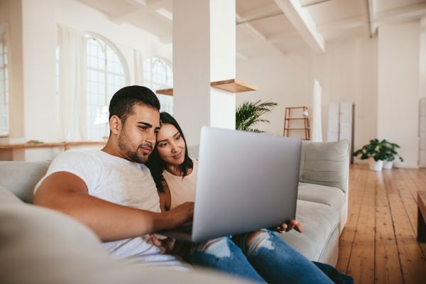 couple researching financing options together